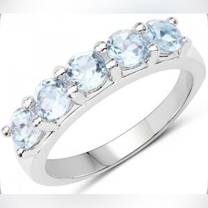 Ring - Brilliant Ladies
Sterling Silver Blue Topaz 
Size 6 
Designer Ring